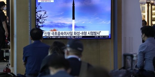 People watch a TV screen showing a news program about North Korea’s reported launch of a hypersonic missile, Seoul, South Korea, Sept. 29, 2021 (AP photo by Lee Jin-man).