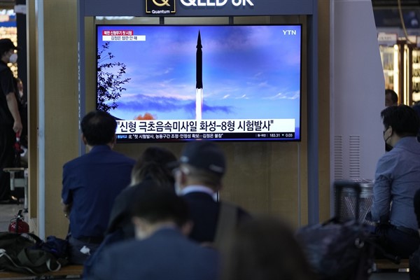 People watch a TV screen showing a news program about North Korea’s reported launch of a hypersonic missile, Seoul, South Korea, Sept. 29, 2021 (AP photo by Lee Jin-man).
