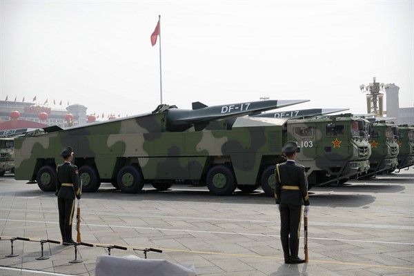 Chinese military vehicles carrying DF-17 ballistic missiles roll during a parade to commemorate the 70th anniversary of the founding of Communist China in Beijing, Oct. 1, 2019 (AP photo by Mark Schiefelbein).