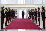 Syrian President Bashar Assad reviews an honor guard at the Syrian Presidential Palace in Damascus, Syria, July 17, 2021 (photo by the Syrian Presidency via Facebook via AP).