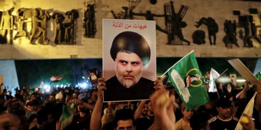 Followers of Shiite cleric Moqtada al-Sadr celebrate after the announcement of the results of parliamentary elections, Baghdad, Iraq, Oct. 11, 2021 (AP photo by Khalid Mohammed).
