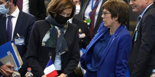 French Defense Minister Florence Parly, center left, speaks with German Defense Minister Annegret Kramp-Karrenbauer, center right, during a meeting of NATO defense ministers at NATO headquarters in Brussels, Oct. 21, 2021 (AP photo by Virginia Mayo).