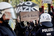 Demonstrators protest against a rally of right-wing extremists in Dortmund, in Germany’s western state of North Rhine-Westphalia, Oct. 9, 2021 (DPA photo by Roland Weihrauch via AP).