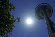 The sun shines near the Space Needle during a record-setting heat wave, Seattle, Washington, June 28, 2021 (AP photo by Ted S. Warren).