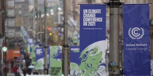 A view of banners promoting the U.N. COP26 climate conference, Glasgow, Scotland, Oct. 29, 2021 (AP photo by Scott Heppell).