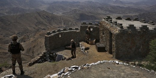 Pakistani troops observe the area from a hilltop post on the Pakistan-Afghanistan border, Khyber district, Pakistan, Aug. 3, 2021 (AP photo by Anjum Naveed).