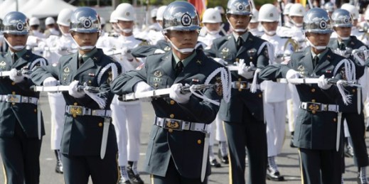 The military honor guard performs during National Day celebrations in front of the Presidential Building in Taipei, Taiwan, Sunday, Oct. 10, 2021 (AP photo by Chiang Ying-ying).
