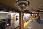 A video surveillance camera is installed above a subway platform in the Court Street station, Brooklyn, Oct. 7, 2020 (AP photo by Mark Lennihan).