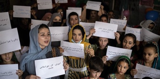 Women and teachers demonstrate inside a private school to demand their rights and equal education for women and girls, Kabul, Afghanistan, Oct. 5, 2021 (AP photo by Ahmad Halabisaz).