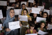 Women and teachers demonstrate to demand their rights and equal education for women in Kabul.