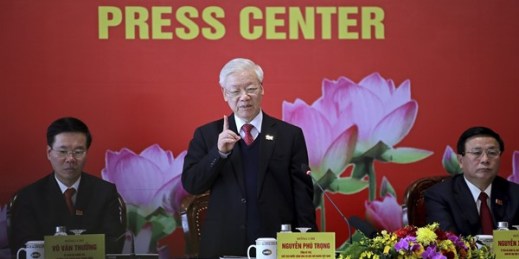 Nguyen Phu Trong, center, speaks during a press conference after his reelection as general secretary of the Communist Party of Vietnam, Hanoi, Vietnam, Feb. 1, 2021 (AP photo by Minh Hoang).