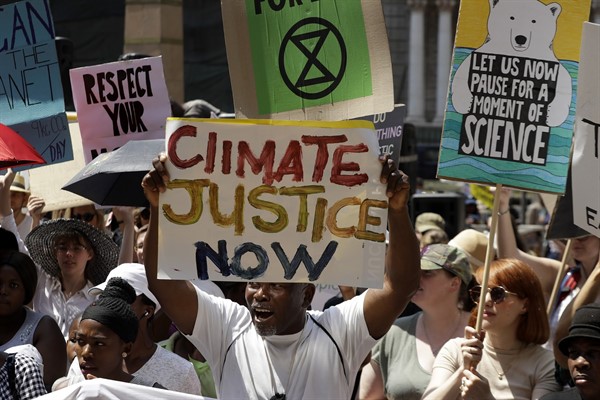 Climate protesters demonstrate outside the local government legislature’s offices in Johannesburg, South Africa, Sept. 20, 2019 (AP photo by Themba Hadebe).