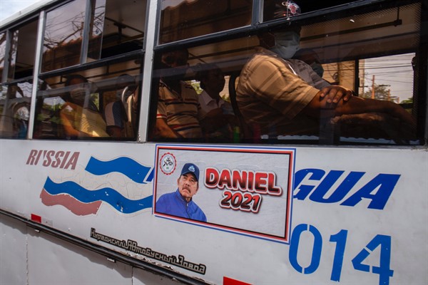 A sign reading “Daniel 2021” next to a picture of Nicaraguan President Daniel Ortega on a public transportation bus, Managua, Nicaragua, June 22, 2021 (DPA photo via AP Images).