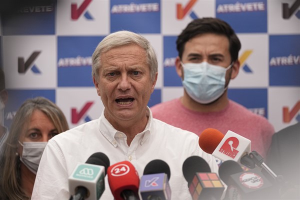 Presidential candidate Jose Antonio Kast, from the Republican Party, campaigns in Santiago, Chile, Nov. 2, 2021 (AP photo by Esteban Felix).