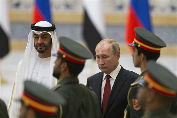 Russian President Vladimir Putin, right, and Abu Dhabi Crown Prince Mohamed bin Zayed Al Nahyan, left, attend an official welcome ceremony in Abu Dhabi, United Arab Emirates, Oct. 15, 2019 (AP photo by Alexander Zemlianichenko).