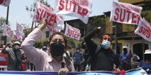 Public teachers shout slogans against Peruvian President Pedro Castillo to demand better labor conditions in Lima, Peru, Nov. 23, 2021 (AP photo by Guadalupe Pardo).
