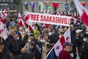Several thousand supporters of the party of former Georgian President Mikheil Saakashvili gather to demand his release from prison due to ill health, in Tbilisi, Russia, Oct. 14, 2021 (AP photo by Shakh Aivazov).