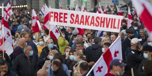 Several thousand supporters of the party of former Georgian President Mikheil Saakashvili gather to demand his release from prison due to ill health, in Tbilisi, Russia, Oct. 14, 2021 (AP photo by Shakh Aivazov).