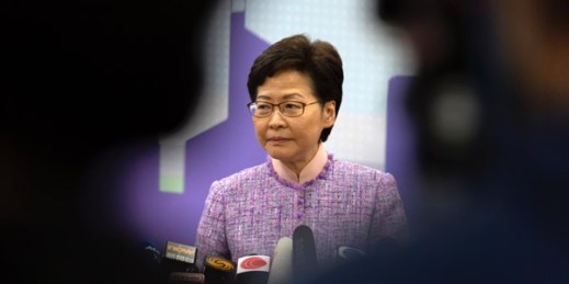 Hong Kong Chief Executive Carrie Lam listens to a reporter’s question during a press conference in Beijing, Dec. 22, 2021 (AP photo by Mark Schiefelbein).