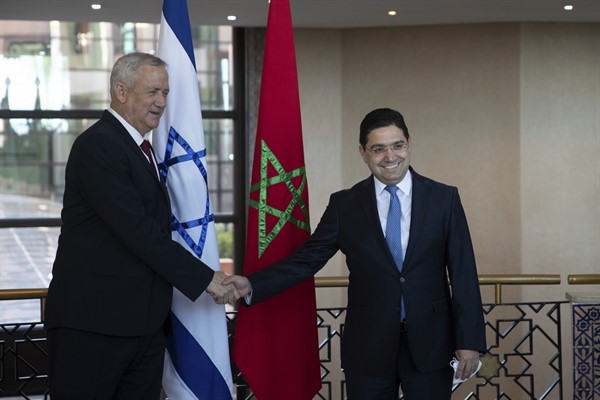 Israeli Defense Minister Benny Gantz, left, is welcomed by Moroccan Foreign Minister Nasser Bourita, right, in Rabat, Morocco, Nov. 24, 2021 (AP photo by Mosa’ab Elshamy).