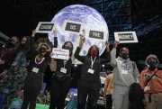 Climate activist Vanessa Nakate, third right, and other activists stage a protest at the COP26 U.N. climate summit in Glasgow, Scotland, Nov. 8, 2021 (AP photo by Alastair Grant).