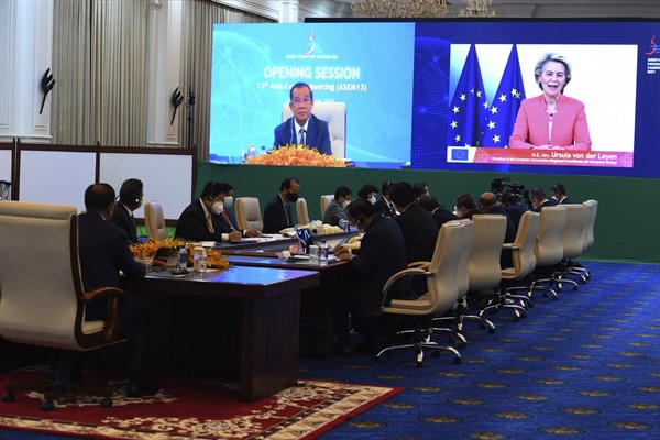 Cambodian Prime Minister Hun Sen and European Commission President Ursula von der Leyen are seen on the screen during an online opening session of the Asia-Europe Meeting, Phnom Penh, Cambodia, Nov. 25, 2021 (photo by An Khoun Sam Aun for the Ministry of