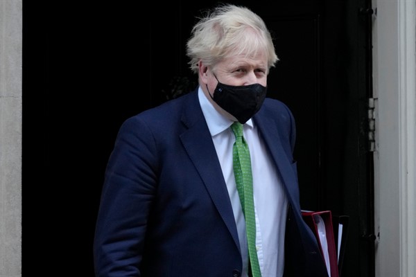 British Prime Minister Boris Johnson leaves 10 Downing Street, in London, Jan. 19, 2022 (AP photo by Kirsty Wigglesworth).