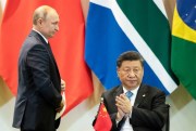 Chinese President Xi Jinping, right, and Russian President Vladimir Putin during the BRICS summit in Brasilia, Brazil, Nov. 14, 2019 (AP photo by Pavel Golovkin).