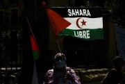 A supporter of the Polisario Front and Western Sahara waves a flag reading “Free Sahara,” Logrono, Spain, June 8, 2021 (AP photo by Alvaro Barrientos).