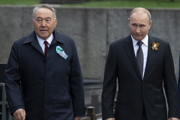 Russian President Vladimir Putin and Kazakhstan’s former president, Nursultan Nazarbayev, arrive to attend the Victory Day military parade, Moscow, Russia, May 9, 2019 (AP photo by Alexander Zemlianichenko).