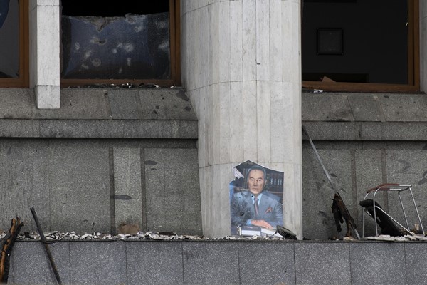 A portrait of former Kazakhstan President Nursultan Nazarbayev is seen at the city hall building after clashes in the central square in Almaty, Kazakhstan, Jan. 10, 2022 (AP photo by Vasily Krestyaninov).