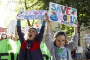 Child activists join a march through Westminster during a “climate strike” demonstration, part of the global Fridays for Future movement led by Swedish teenage environmentalist Greta Thunberg, in London, Sept. 24, 2021 (AP photo by David Cliff).