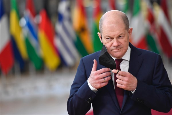 German Chancellor Olaf Scholz arrives for an EU-AU summit at the European Council building in Brussels, Feb. 17, 2022 (AP photo by Geert Vanden Wijngaert).