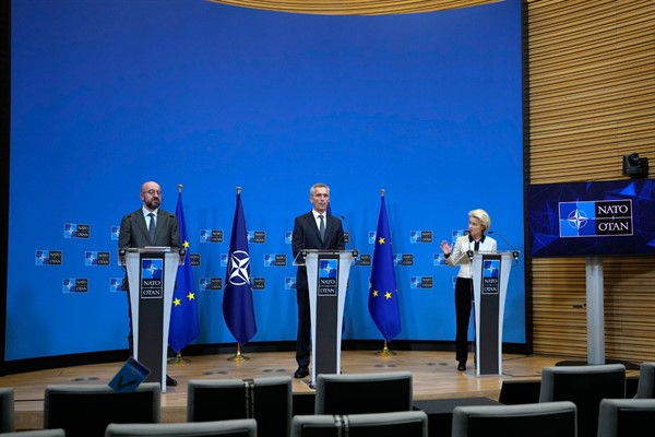 NATO Secretary General Stoltenberg participates in a media conference with European Commission President von der Leyen and European Council President Michel, Brussels, Feb 24, 2022 (AP photo by Virginia Mayo).