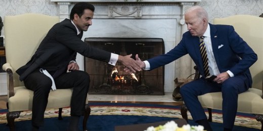 President Joe Biden, right, shakes hands with Qatari Emir Sheikh Tamim bin Hamad al-Thani in the Oval Office of the White House, in Washington, Jan. 31, 2022 (AP photo by Alex Brandon).