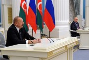 Azerbaijani President Ilham Aliyev speaks during a joint news conference with Russian President Vladimir Putin following their talks in the Kremlin in Moscow, Russia, Feb. 22, 2022 (Sputnik photo by Mikhail Klimentyev via AP).