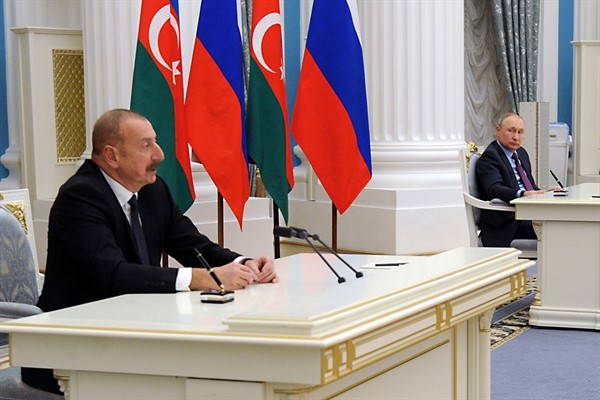 Azerbaijani President Ilham Aliyev speaks during a joint news conference with Russian President Vladimir Putin following their talks in the Kremlin in Moscow, Russia, Feb. 22, 2022 (Sputnik photo by Mikhail Klimentyev via AP).
