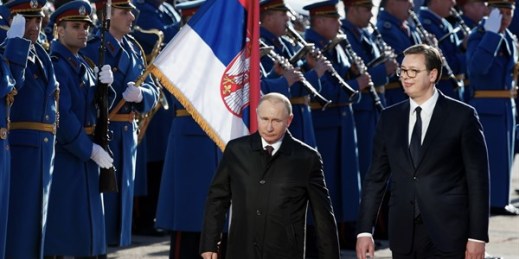 Serbian President Aleksandar Vucic and Russian President Vladimir Putin attend an official welcome ceremony prior to their talks in Belgrade, Serbia, Jan. 17, 2019 (AP photo by Darko Vojinovic).