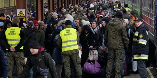 Refugees from Ukraine arrive at the railway station in Przemysl, Poland, Feb. 27, 2022 (AP photo by Czarek Sokolowski).