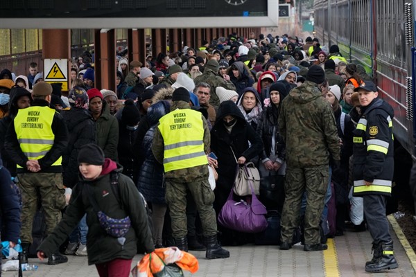 Refugees from Ukraine arrive at the railway station in Przemysl, Poland, Feb. 27, 2022 (AP photo by Czarek Sokolowski).
