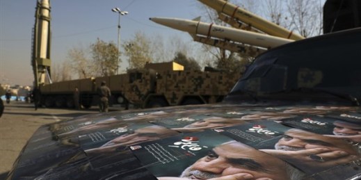 Posters of Iranian Gen. Qassem Soleimani, who was killed in Iraq in a U.S. drone attack January 2020, are seen in front of three ballistic missiles on display in Tehran, Iran, Jan. 7, 2022. Iran put (AP photo by Vahid Salemi).