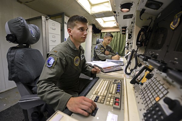 A U.S. nuclear missileer crew checks systems in the underground control room where they work a 24-hour shift at an ICBM launch control facility near Minot, N.D., June 24, 2014 (AP photo by Charlie Riedel).