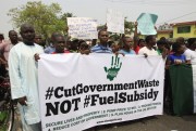Nigerian youths protest in front of the state television station during nationwide strikes against the removal of a fuel subsidy by the government of then-President Goodluck Jonathan, Lagos, Nigeria, Jan. 12, 2012 (AP photo by Sunday Alamba).
