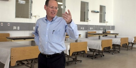 Dr. Paul Farmer gestures during the inauguration of the national referral and teaching hospital in Mirebalais, Haiti, Jan. 10, 2012 (AP photo by Dieu Nalio Chery).