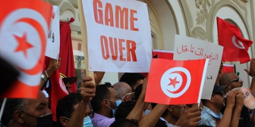 Tunisians demonstrate in support of Tunisian President Kais Saied in Tunis, Tunisia, Oct. 3, 2021 (AP photo by Hassene Dridi).