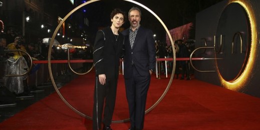 Timothee Chalamet, left, and director Denis Villeneuve pose for photographers upon arrival at the premiere of the film “Dune” in London, Oct. 18, 2021 (Invision photo by Joel C Ryan via AP).