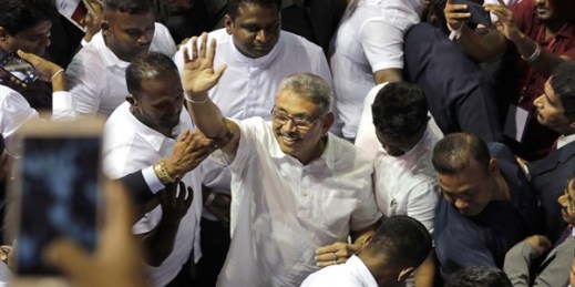 Former Sri Lankan Defense Secretary Gotabaya Rajapaksa waves to supporters during a party convention held to announce the presidential candidacy in Colombo, Sri Lanka, Aug. 11, 2019 (AP photo by Eranga Jayawardena).