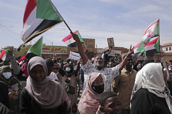 People chant slogans during a protest to denounce the October 2021 military coup, Khartoum, Sudan, Jan. 2, 2022 (AP photo by Marwan Ali).