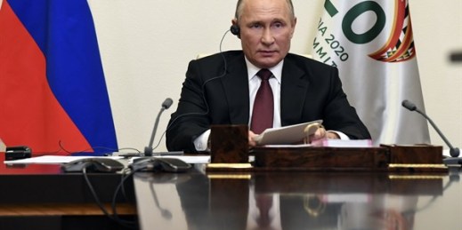 Russian President Vladimir Putin attends the G20 summit hosted by Saudi Arabia via video conference at the Novo-Ogaryovo residence outside Moscow, Russia, Nov. 21, 2020 (Sputnik photo by Alexei Nikolsky via AP).
