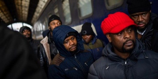 African residents in Ukraine wait at the platform inside Lviv railway station, Lviv, Ukraine, Feb. 27, 2022 (AP photo by Bernat Armangue).